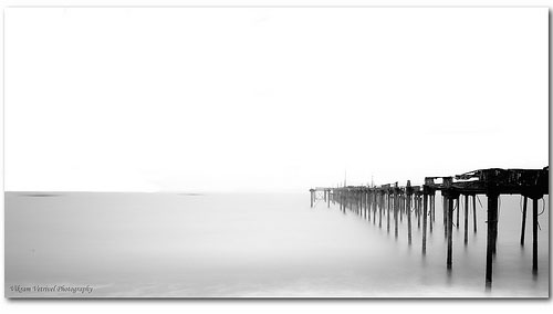 An image of the sea where all the waves have been blurred in to a soft surface due to the use of a neutral density filter