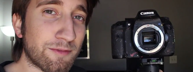 Photograph of Gavin Free from YouTube's The Slow Mo Guys stanting next to an SLR camera